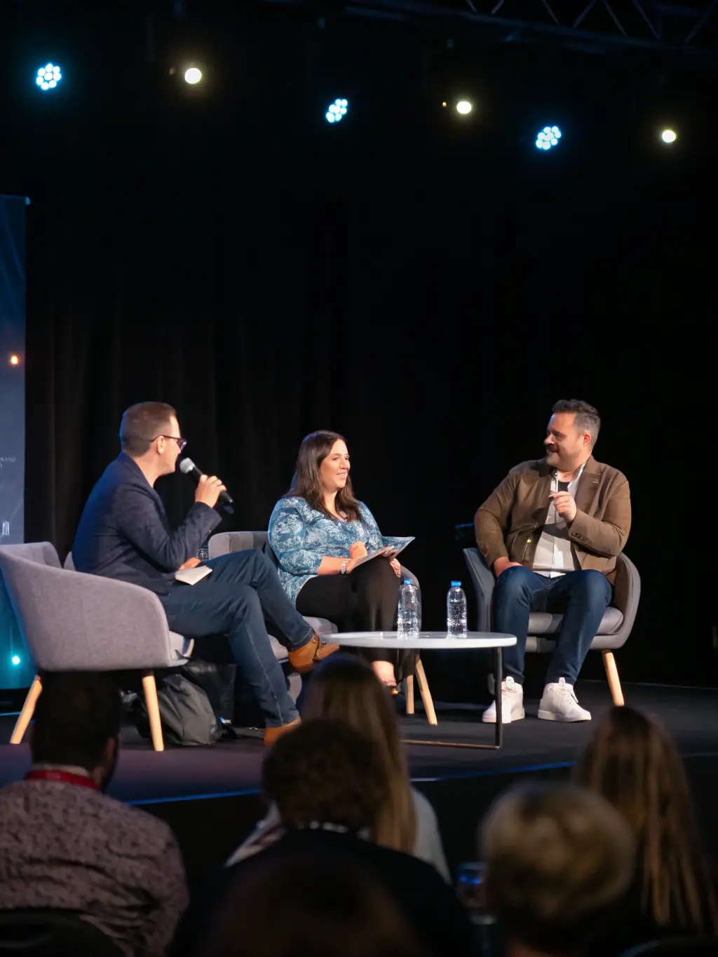 A panel discussion featuring industry experts debating the future of virtual funding and its impact on digital conferences.